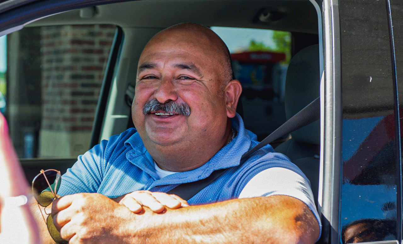 Texas Trust Employee speaking with a member