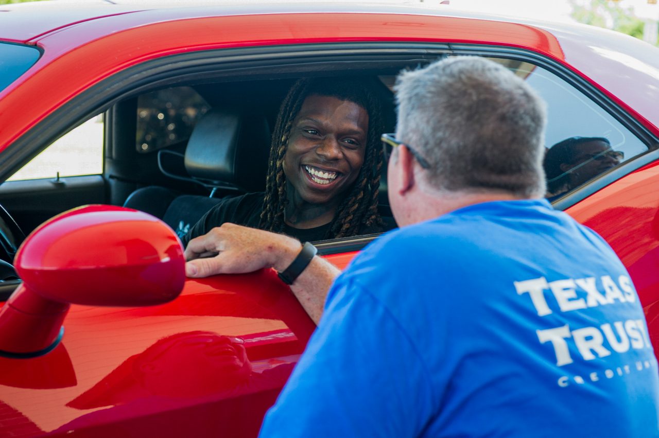 Texas Trust Employee speaking with a member
