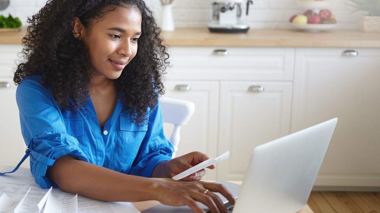 young lady looking at finances