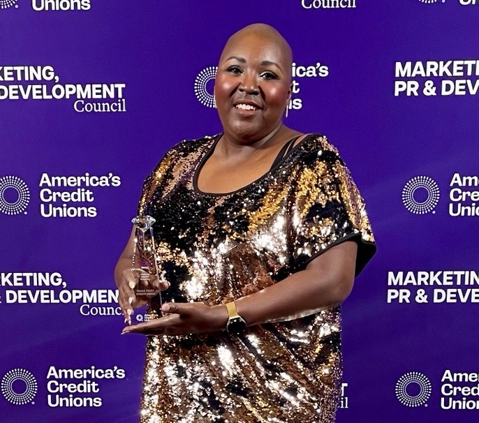 AVP of Public Relations Toni Nichols accepts Diamond Award from America's Credit Unions