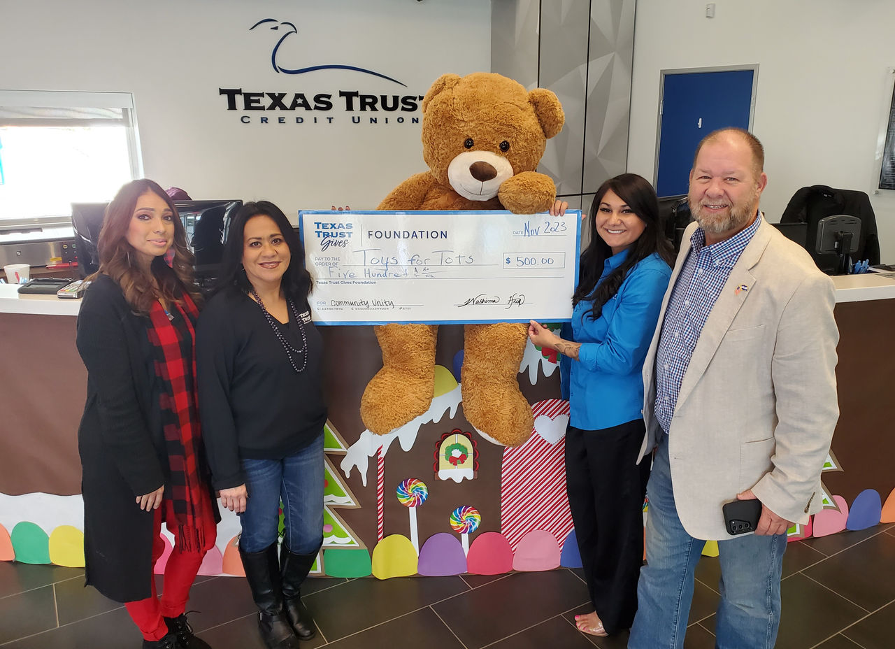 Texas Trust Presenting Toys for Tots Check Donation