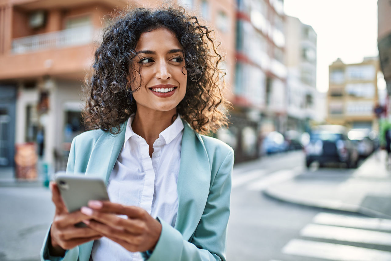 Happy woman on mobile phone