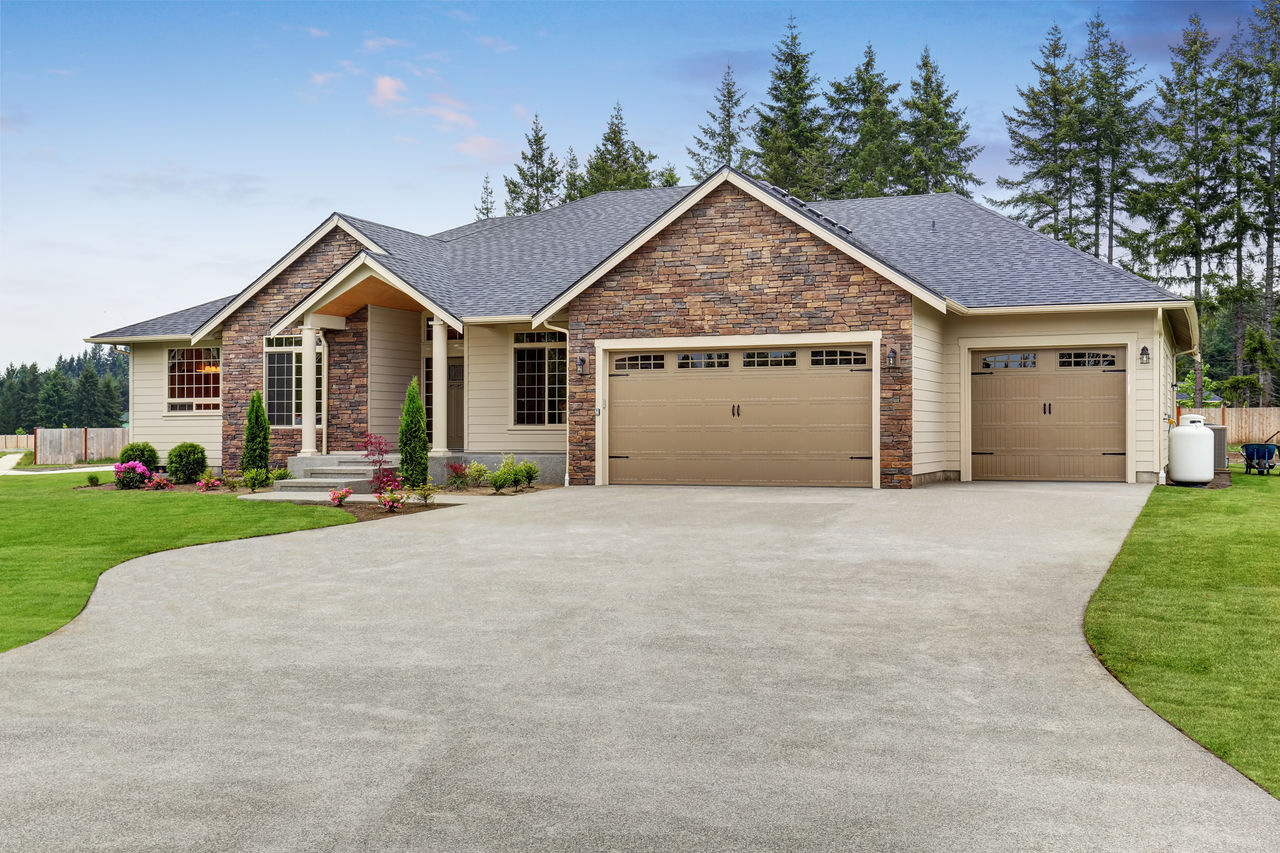 Mature indian man shaking hands with financial advisor at home. Happy smiling couple greeting broker with handshake at home. Multiethnic mid adult man and hispanic woman sealing a contract.